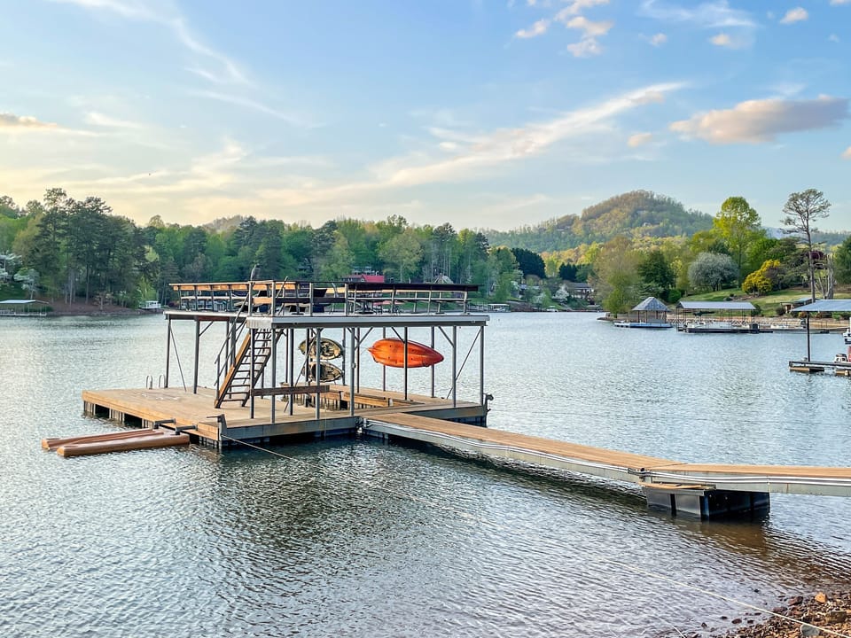 Enjoy the lake from the covered dock with boat slip and sun deck.