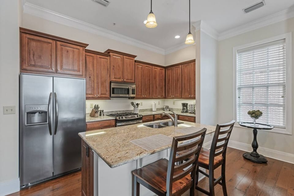 Open Kitchen with 2 counter stools.