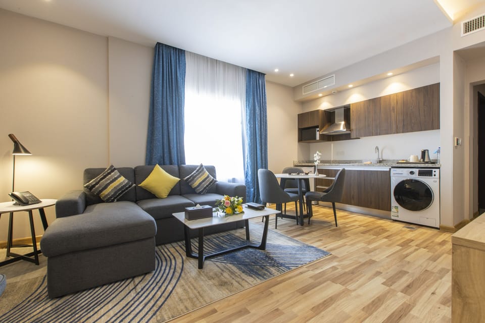Superior Suite | Living area | 43-inch LED TV with digital channels, TV