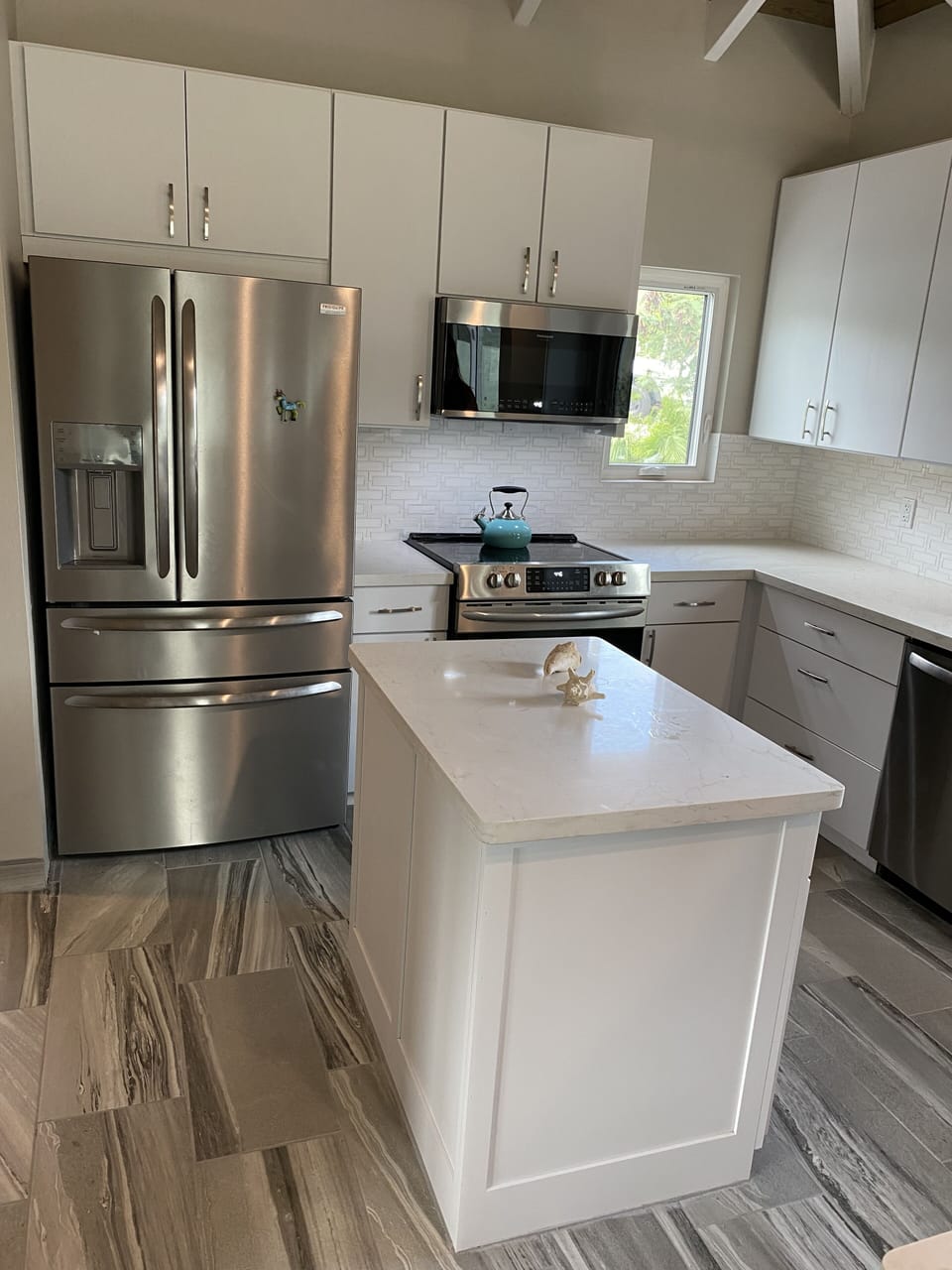 State of the art kitchen with stainless steel appliances