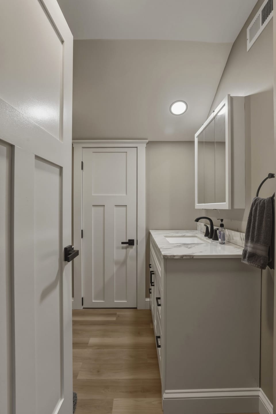 Upstairs bathroom with walk in shower. 