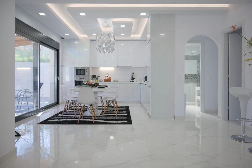 Villa | Private kitchen | Fridge, microwave, oven, stovetop