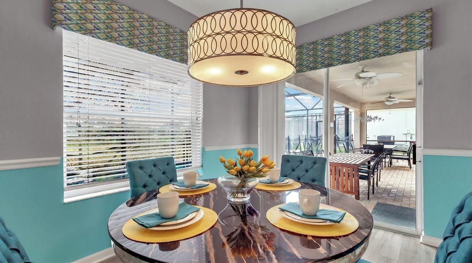 Indulge in culinary delights in our beautifully furnished breakfast table, offering you a luxurious setting to savor delicious meals and create unforgettable memories.