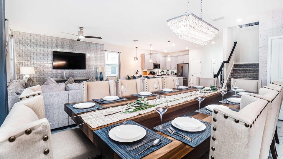 The dining area generously accommodates everyone with a grand 12-seater dining setup.