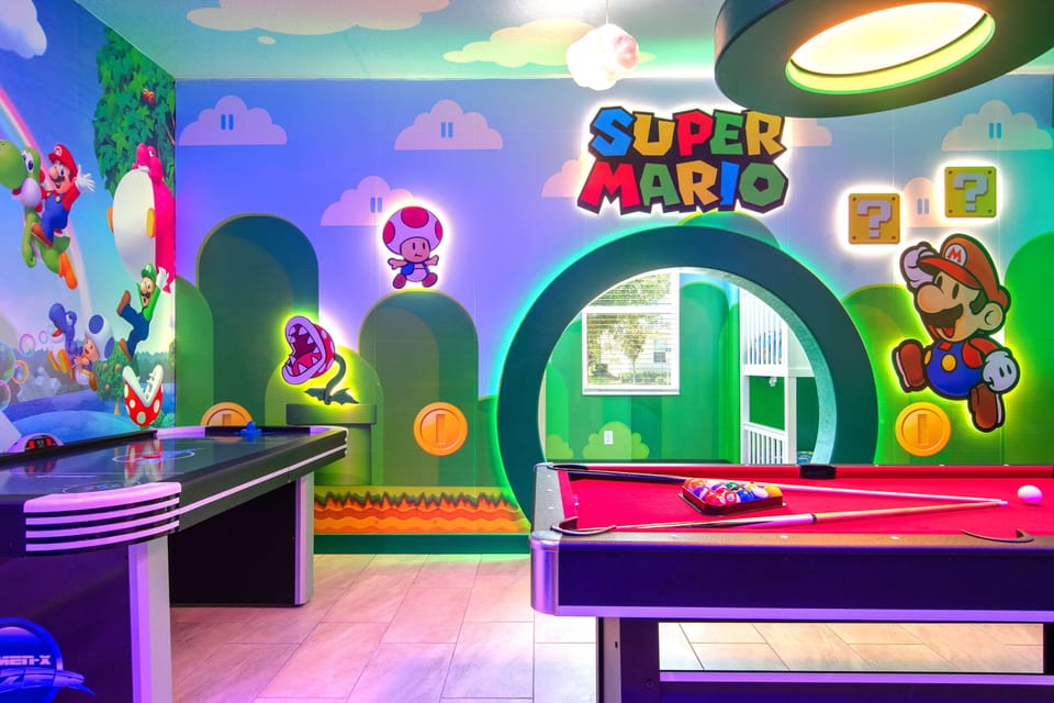 Super Mario-themed game room with pool, air hockey, and vibrant decor fun!
