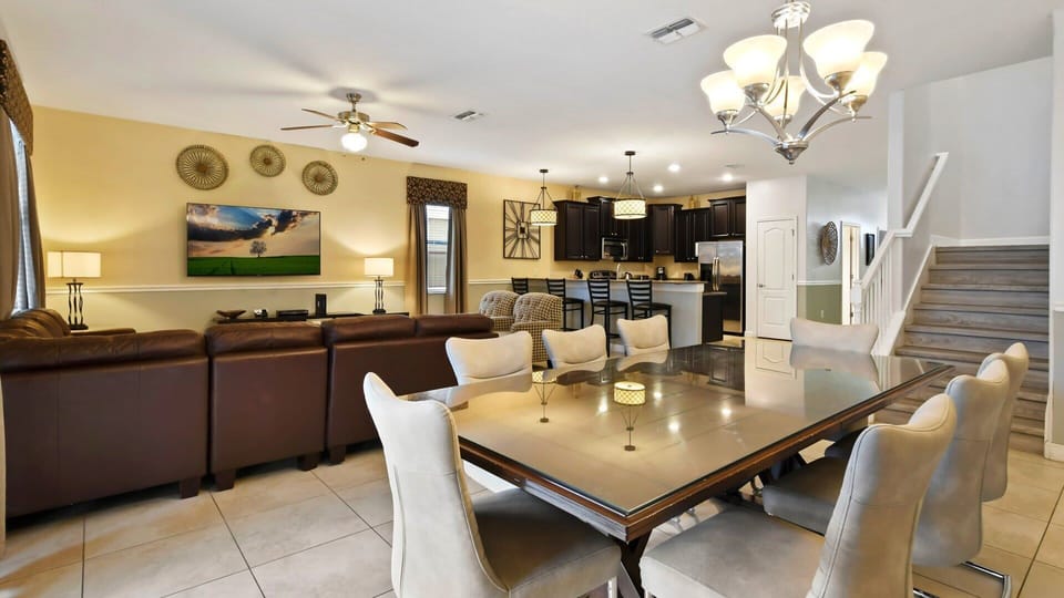 A spacious and inviting dining area featuring an elegant 8-seater dining table.