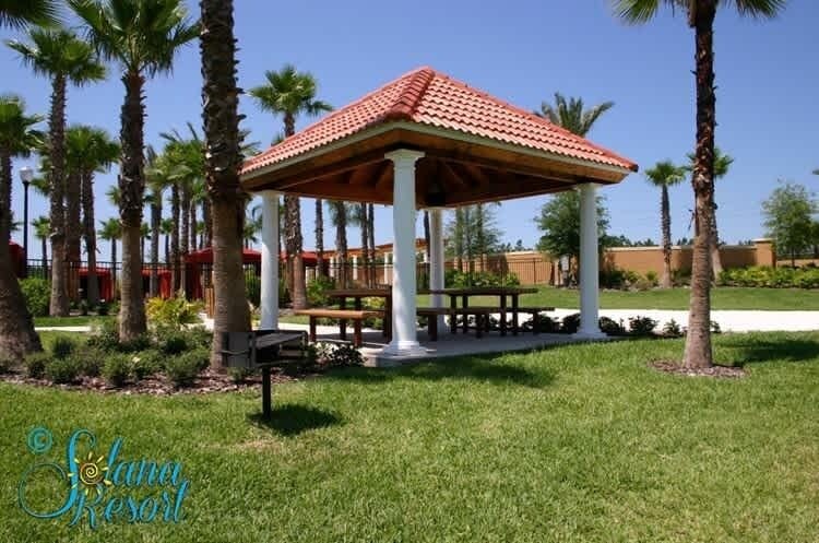 
Miniature golf course, gazebo, and palm trees at Solana Resort on a sunny day.