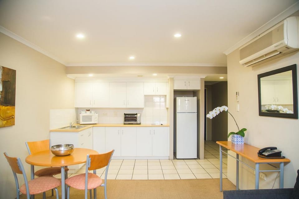 Deluxe One Bedroom Apartment | Private kitchen | Microwave, electric kettle, toaster