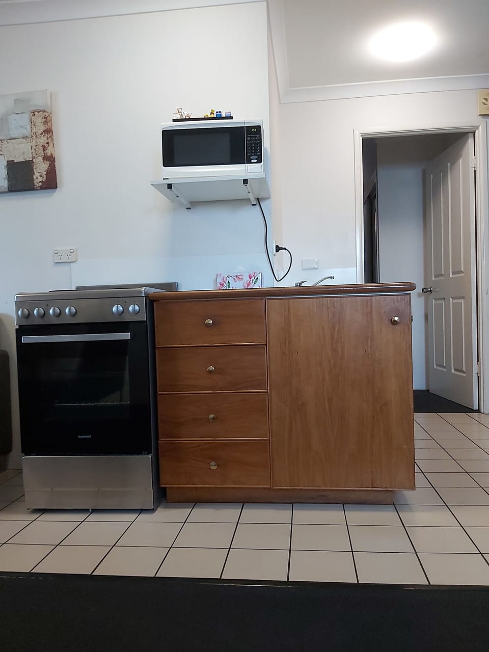 Three Bedroom Apartment | Private kitchen | Microwave, electric kettle, toaster