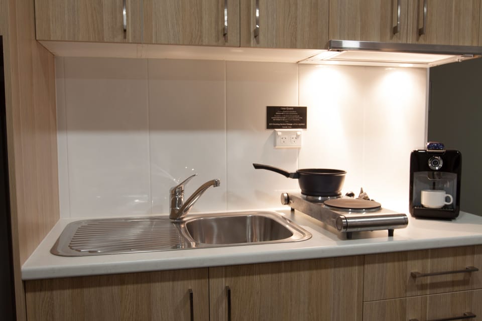 Family Room | Private kitchenette | Coffee/tea maker, fridge, microwave, electric kettle