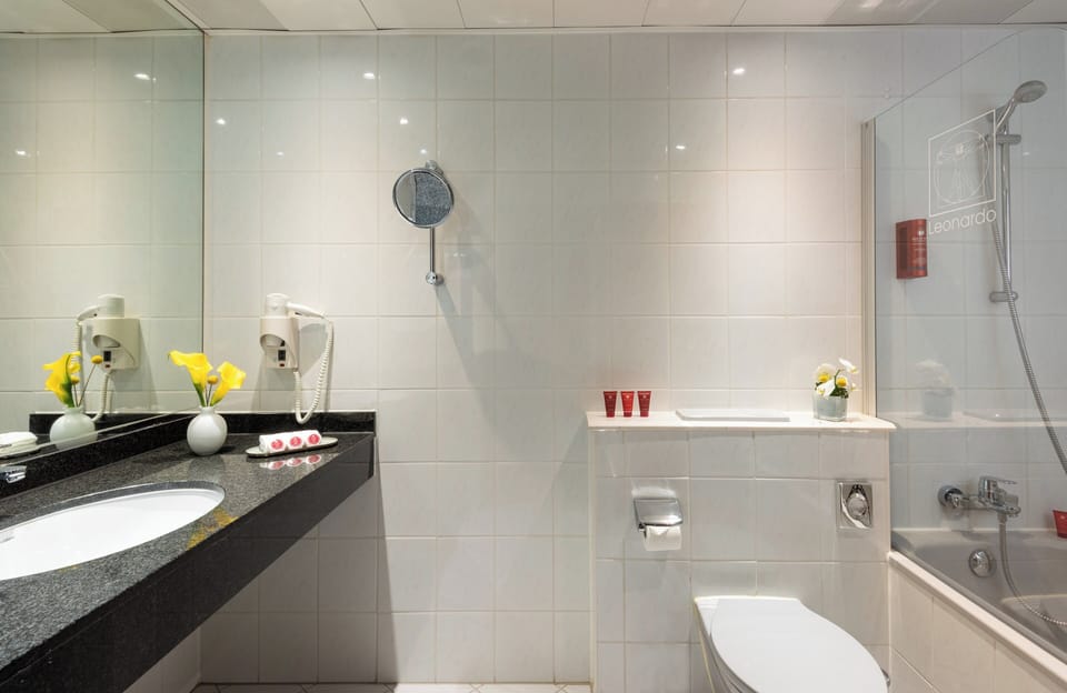Combined shower/tub, eco-friendly toiletries, hair dryer, towels