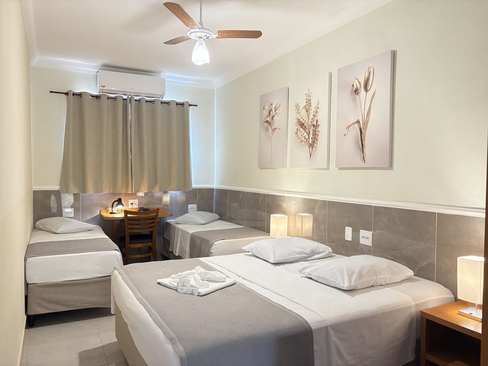 Standard Quadruple Room | Hypo-allergenic bedding, down comforters, desk, laptop workspace
