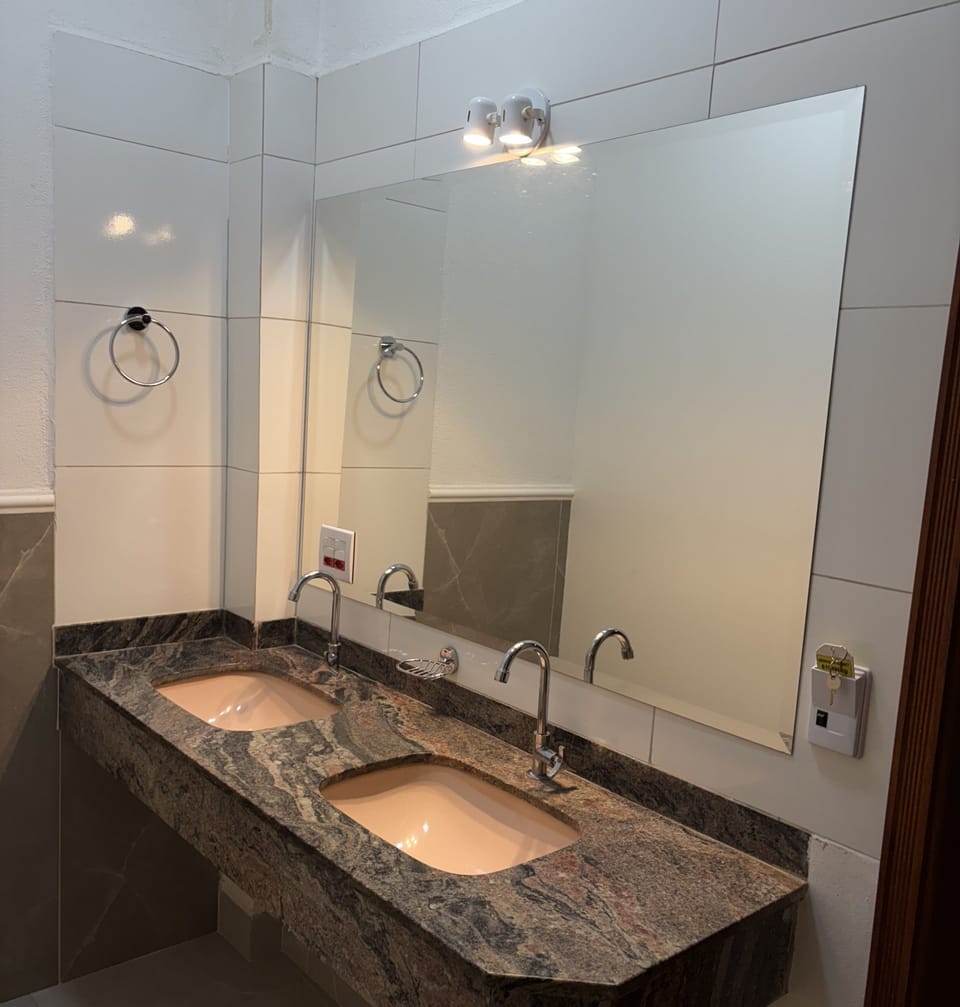 Standard Quadruple Room | Bathroom | Shower, towels, soap, toilet paper