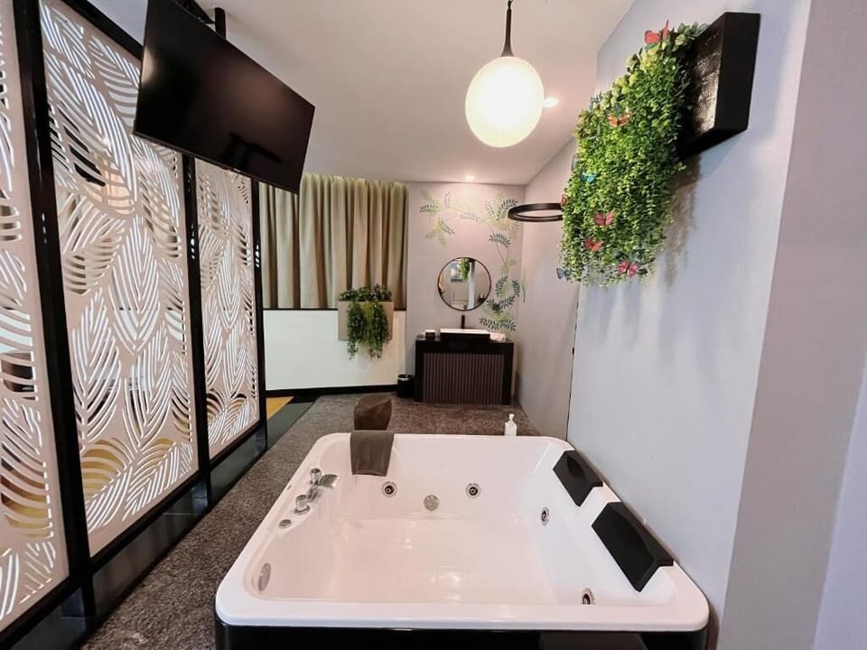 Suite Room Seminyak Harmony | Bathroom | Separate tub and shower, jetted tub, rainfall showerhead
