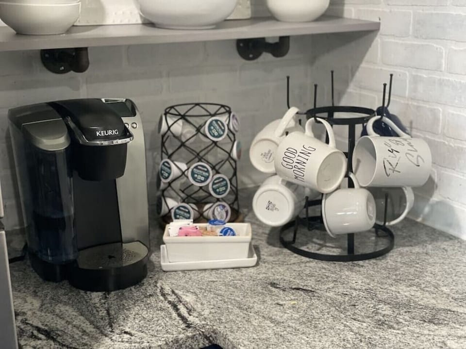 Keurig provided with starter pods for your coffee needs.  Home also has a coffee maker for those who need a pot of coffee.