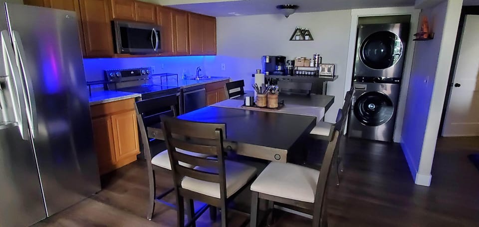 Full kitchen w/ new appliances, coffee bar, large dining table