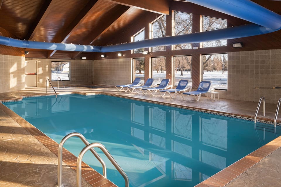 Indoor pool, open 7:00 AM to 10:00 PM, sun loungers