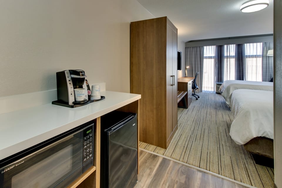 Suite, 1 King Bed with Sofa bed, Accessible (Communications, Roll-In Shower) | In-room safe, desk, laptop workspace, iron/ironing board