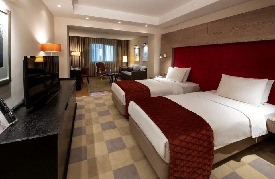 Standard Twin Room | Minibar, in-room safe, desk, soundproofing