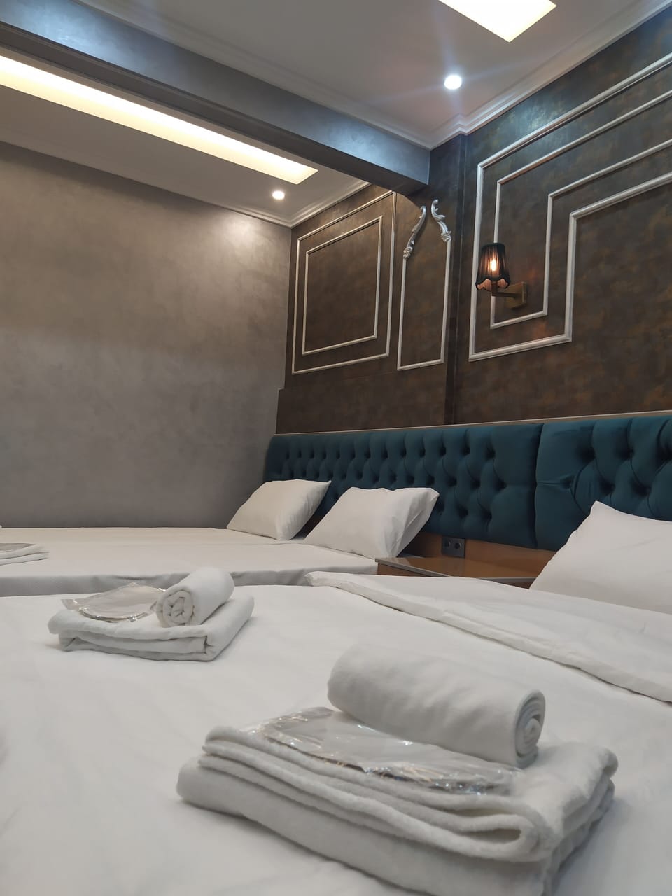 Family Quadruple Room | Premium bedding, minibar, in-room safe, individually decorated