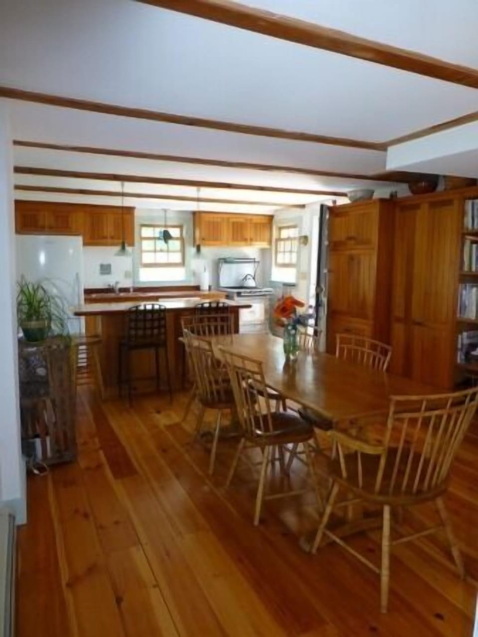 Hand-made table can accommodate up to 10 with the extensions.