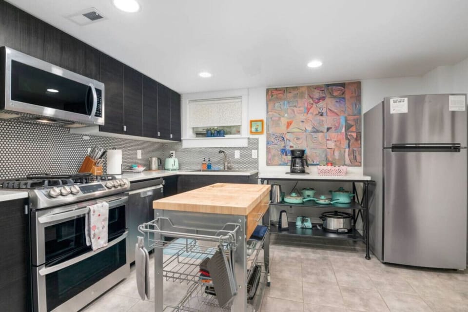 Chef`s kitchen, fully stocked, with all new high-end appliances.