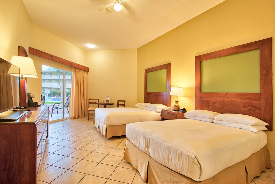 Premium bedding, down comforters, pillowtop beds, in-room safe