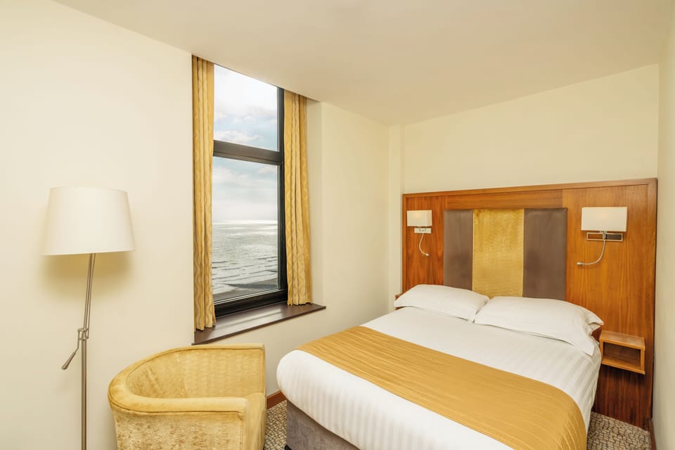 Economy Double Room, Sea View | In-room safe, desk, laptop workspace, iron/ironing board