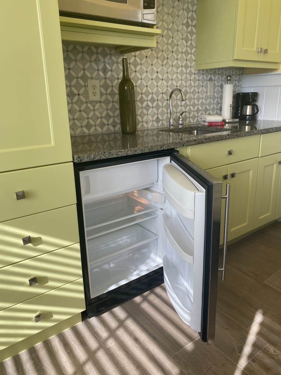 Kitchenette with mini fridge/freezer, drip coffee maker & microwave