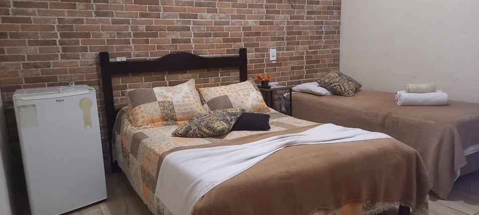 Economy Triple Room | Minibar, free WiFi