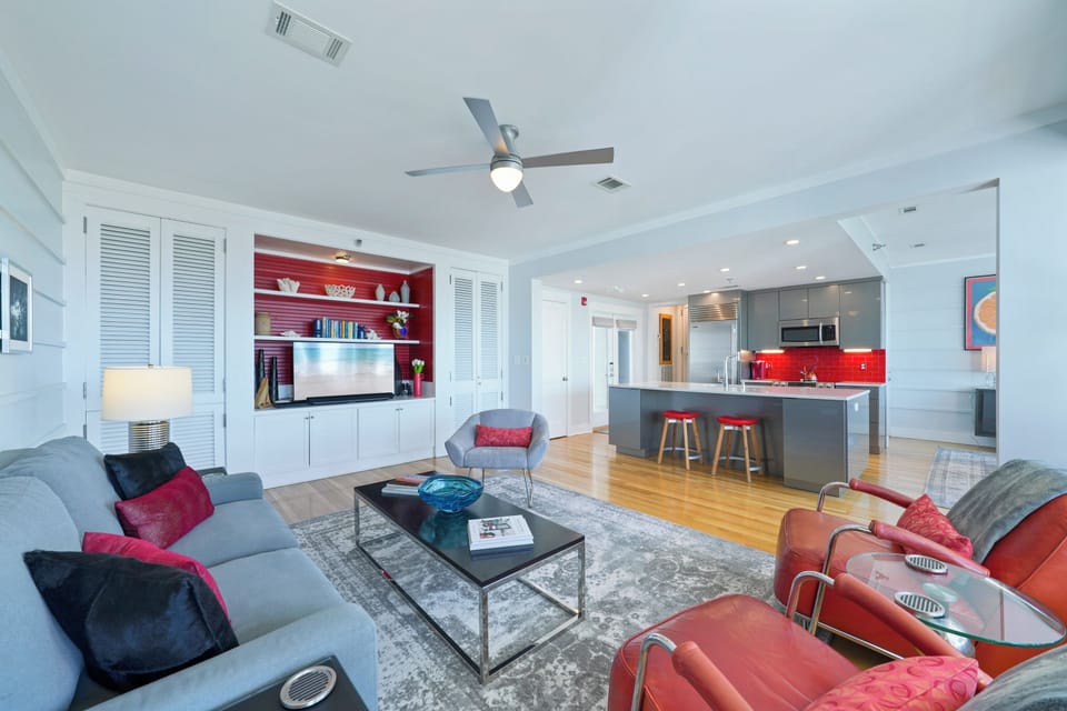 LIVING VIEW TO CENTRAL MODERN KITCHEN