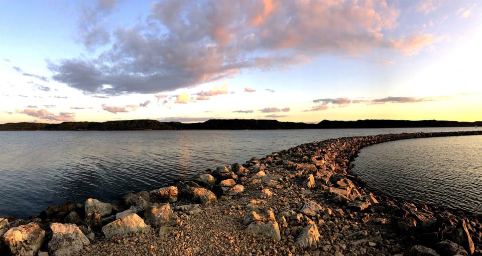 Talk a walk out on the breakwater and enjoy a stunning sunset.