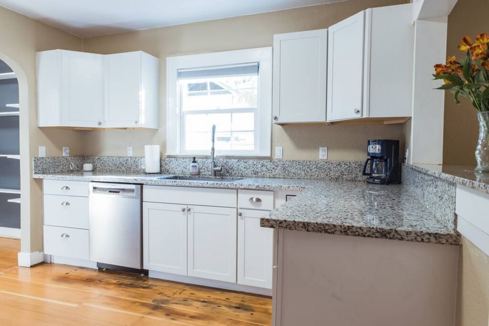 Enjoy mornings in this bright kitchen—brew fresh coffee, prep breakfast, and start your day relaxed.