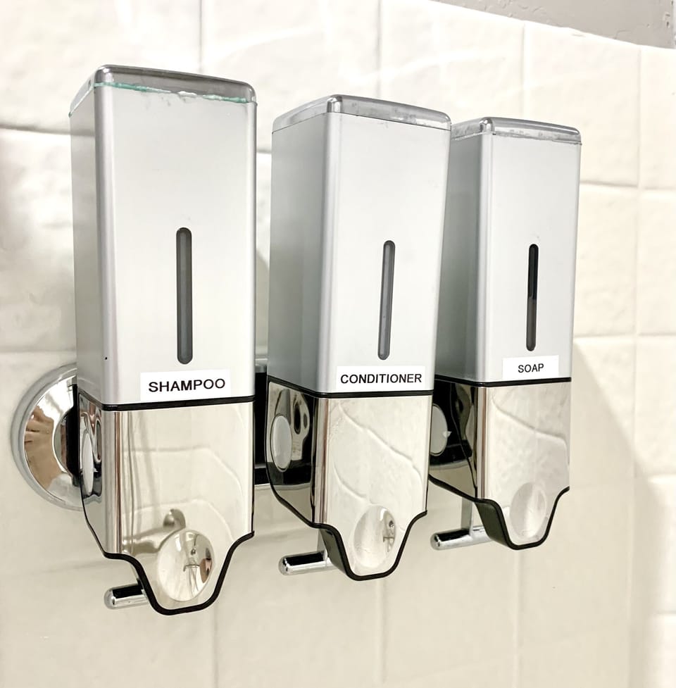 Shower dispenser