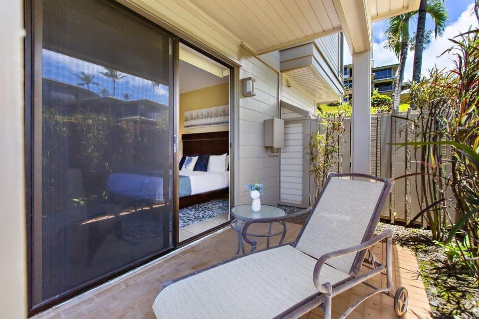 Lounge on the bedroom's private lanai