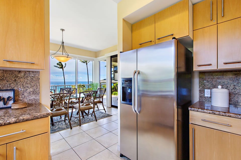 Beautifully remodeled kitchen featuring stainless appliances and granite counter-tops