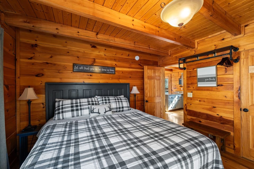 Easy access to the kitchen, living room, top floor deck and attached walk in shower en suite