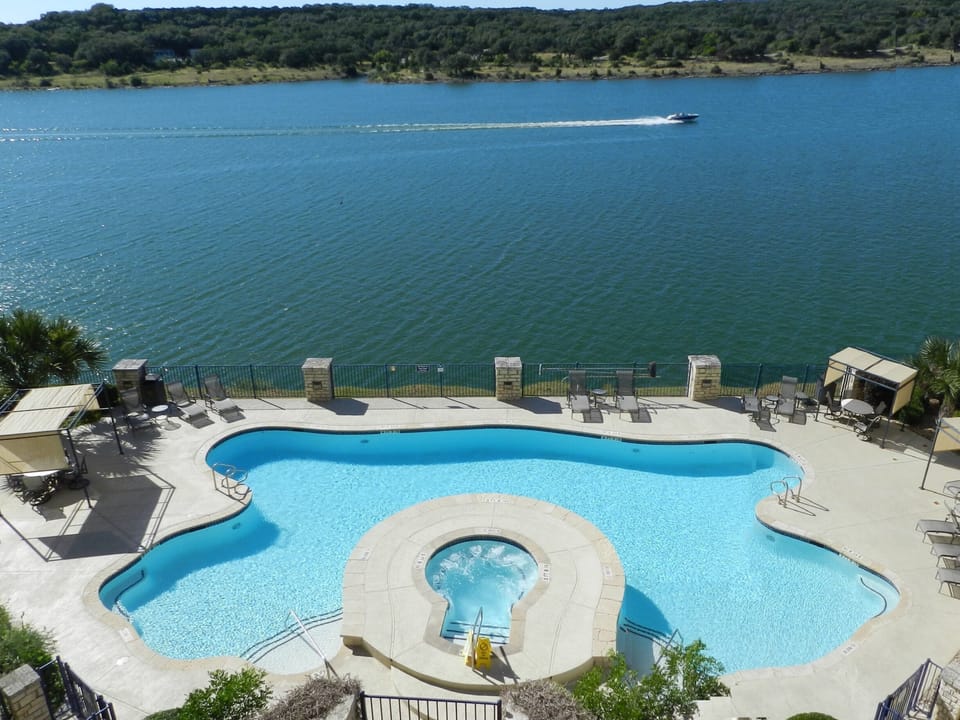 One of two outdoor pool/hot tub