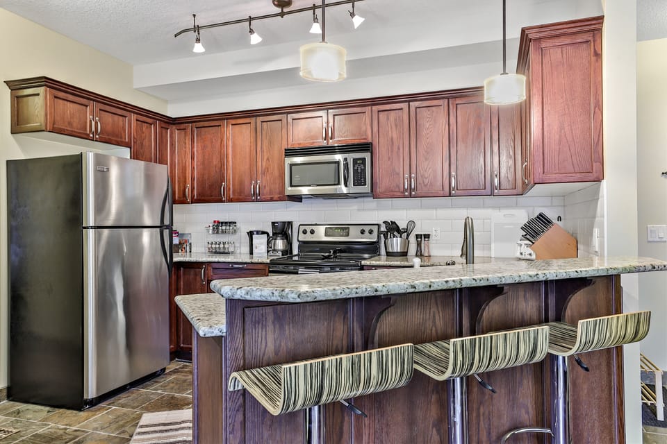 Kitchen with new Paderno pots, pans and knives. Locally-roasted Eclipse coffee.
