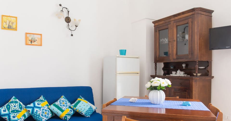 Apartment | Living room | 24-inch flat-screen TV with cable channels, TV