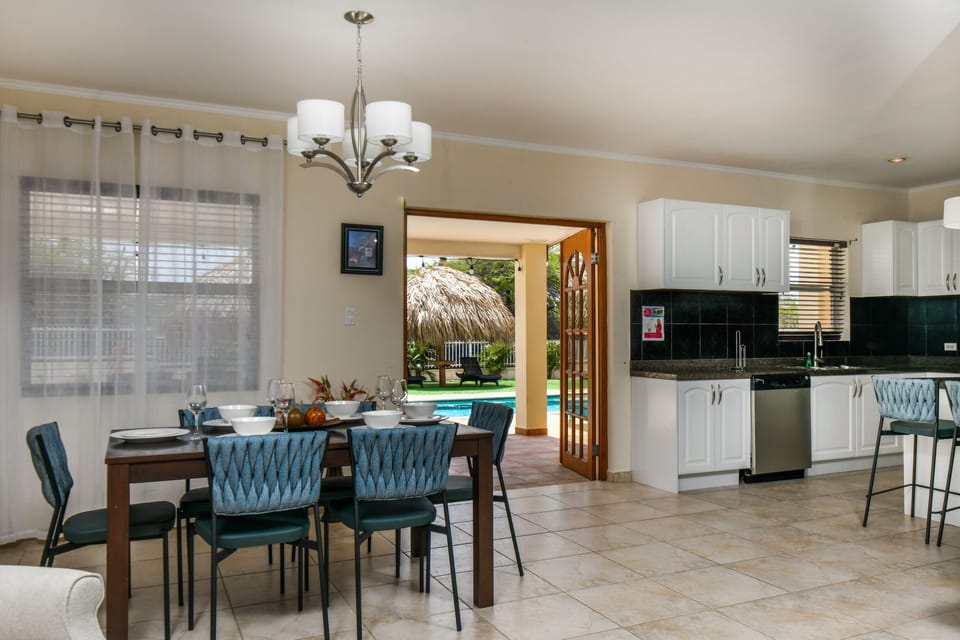 Seamless indoor-outdoor living: Our living area provides easy access to the backyard, extending your space for relaxation and entertainment.