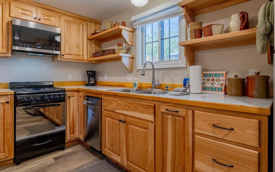 With modern appliances, the well stocked kitchen is perfect for whipping up a quick breakfast or picnic lunch