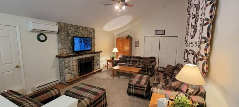 Upper Level TV Sitting Area, Fireplace is a facade only, not operational