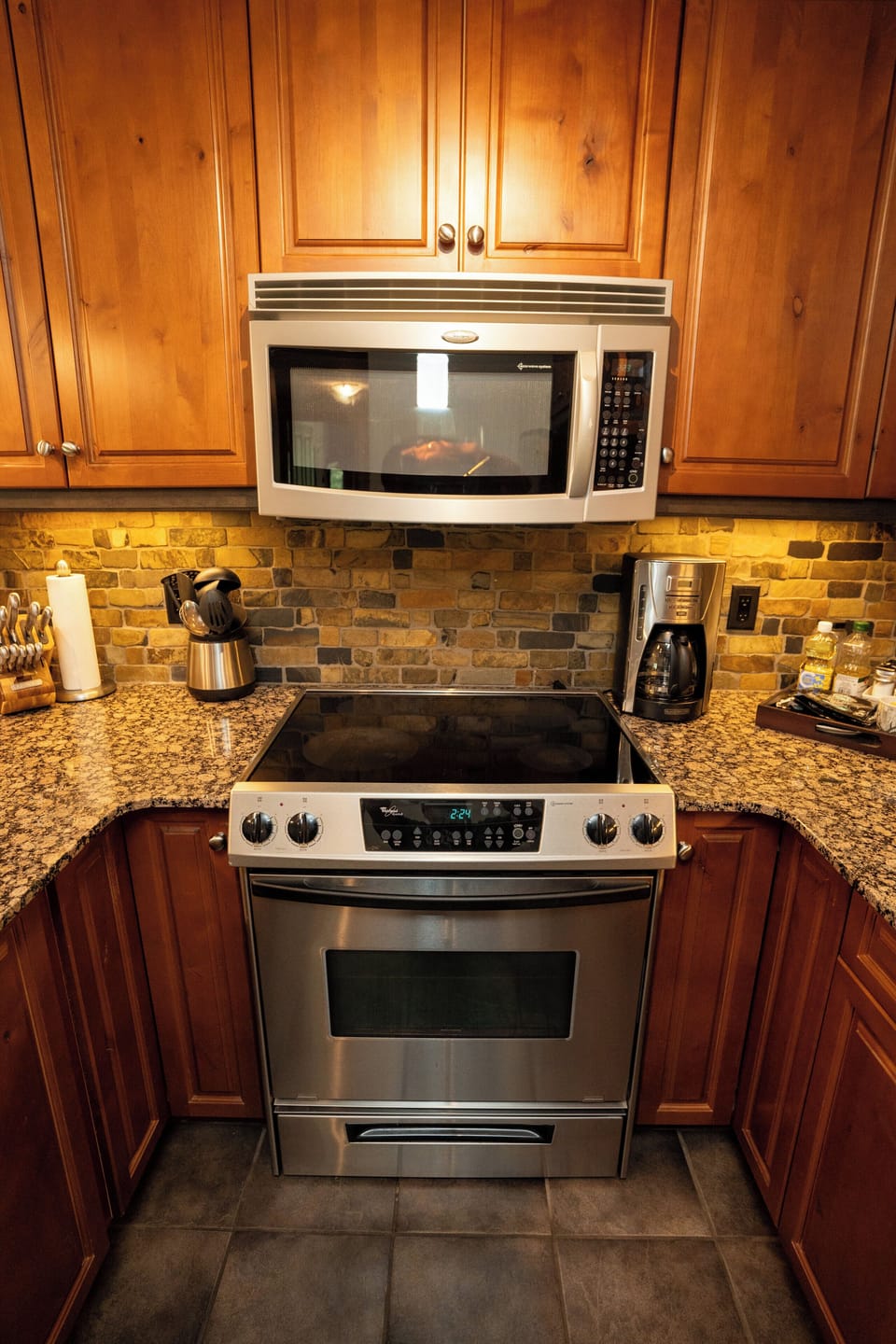 Microwave and stove in the kitchen