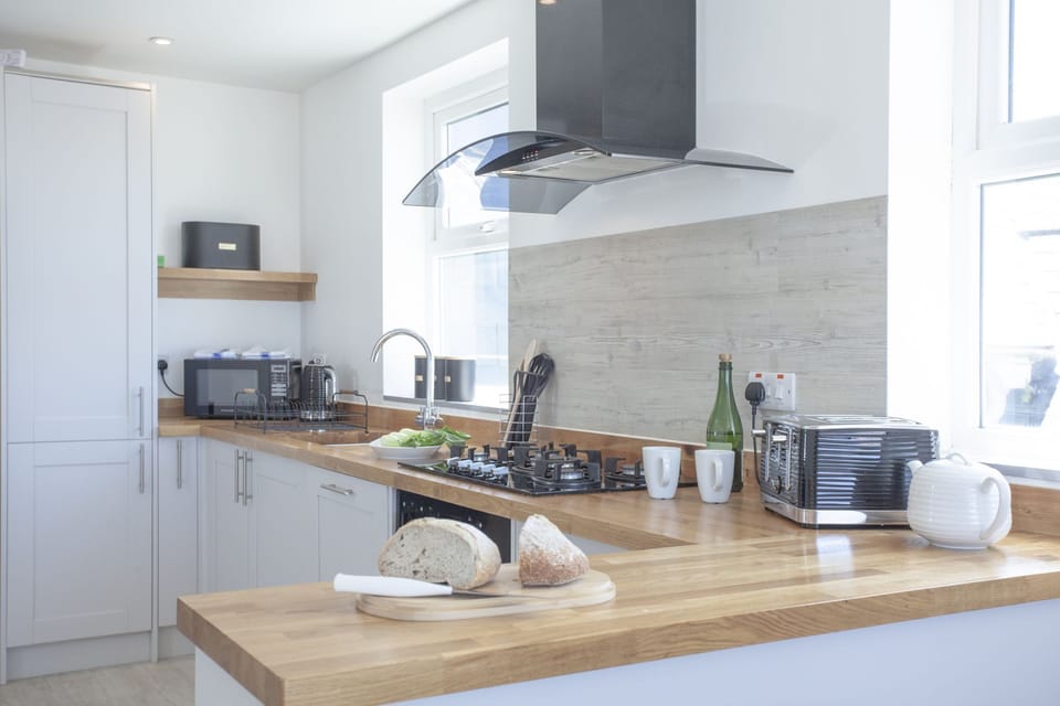 Kitchen with microwave and ample storage - Ocean View