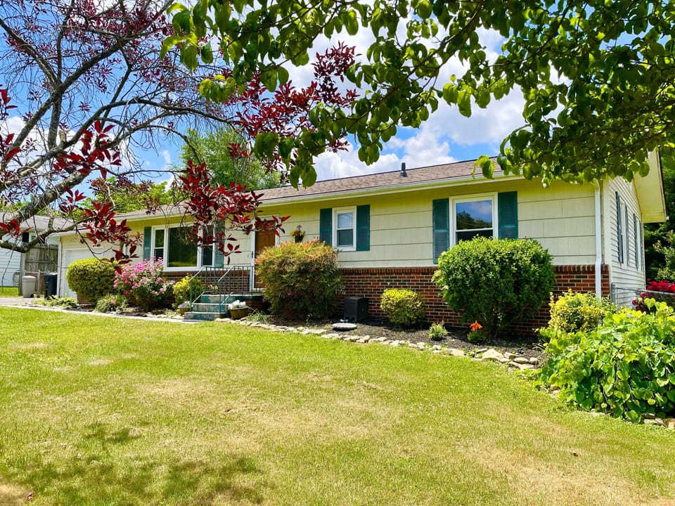 Redbud Retreat-named after our little prized weeping redbud in the front garden