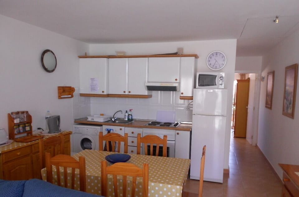 Kitchen/Dining area, kettle, toaster, oven, hob, washing machine, microwave, etc
