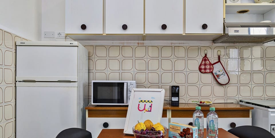 Apartment | Private kitchen | Full-size fridge, microwave, oven, stovetop