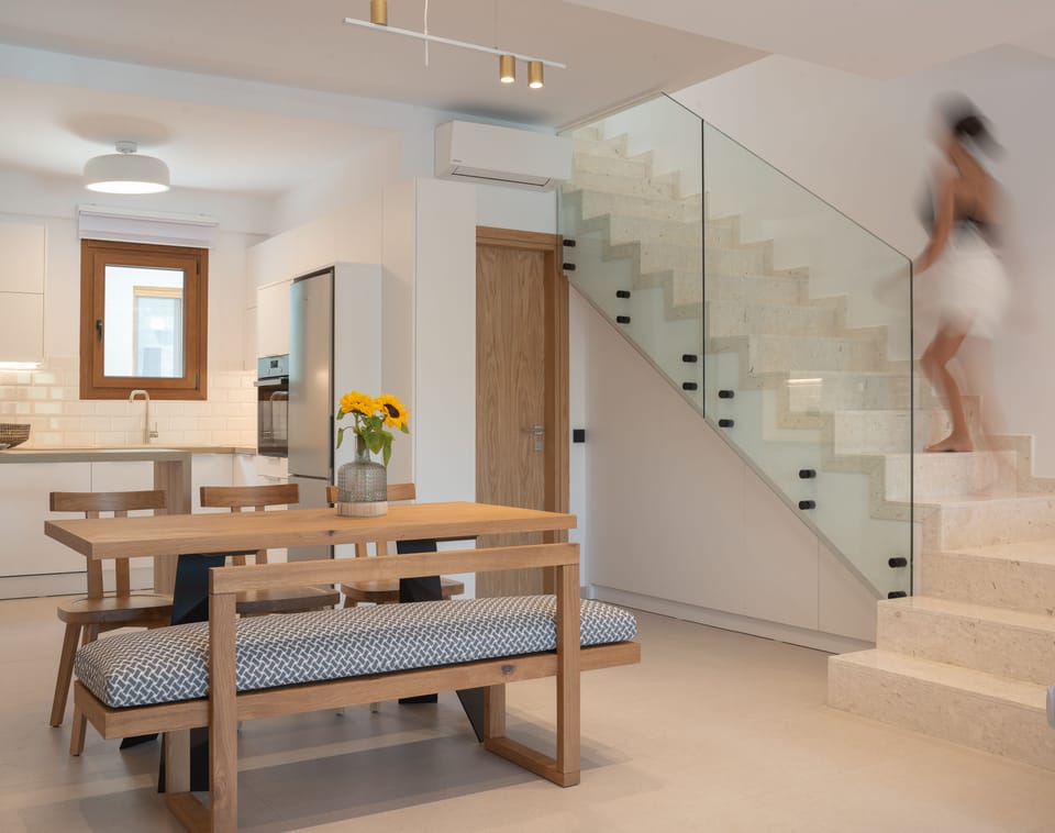 The open plan kitchen-dining area.