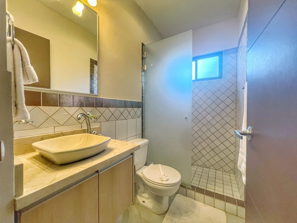 A full bathroom sits just off the second bedroom.  